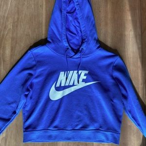 Blue Nike cropped sweatshirt.